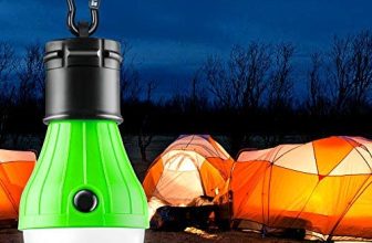 lime green and white camping light with lit up tents in background